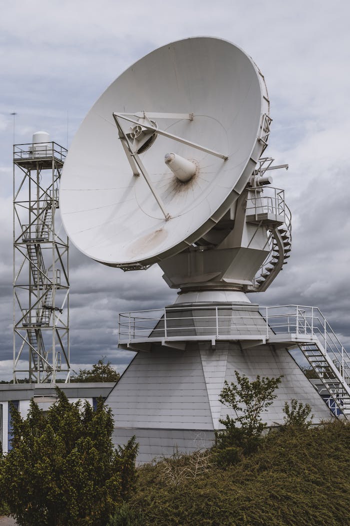 A massive satellite dish stationed outdoors in Riedstadt, Germany.